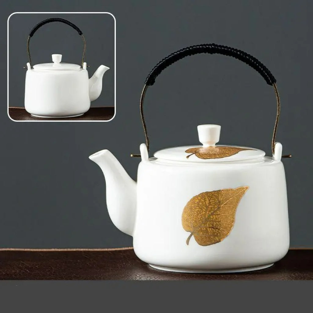 Tetera de Porcelana con Asa y Distintos Motivos Artísticos