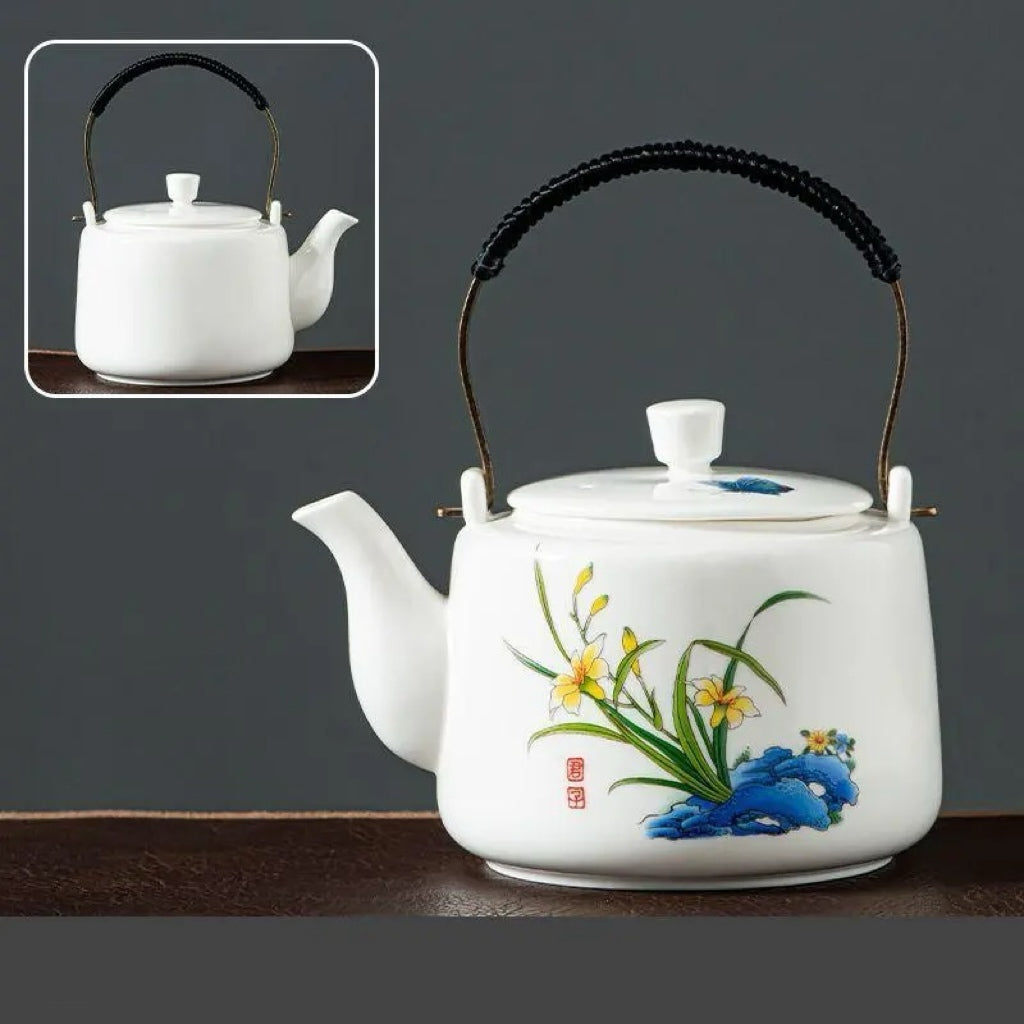 Tetera de Porcelana con Asa y Distintos Motivos Artísticos